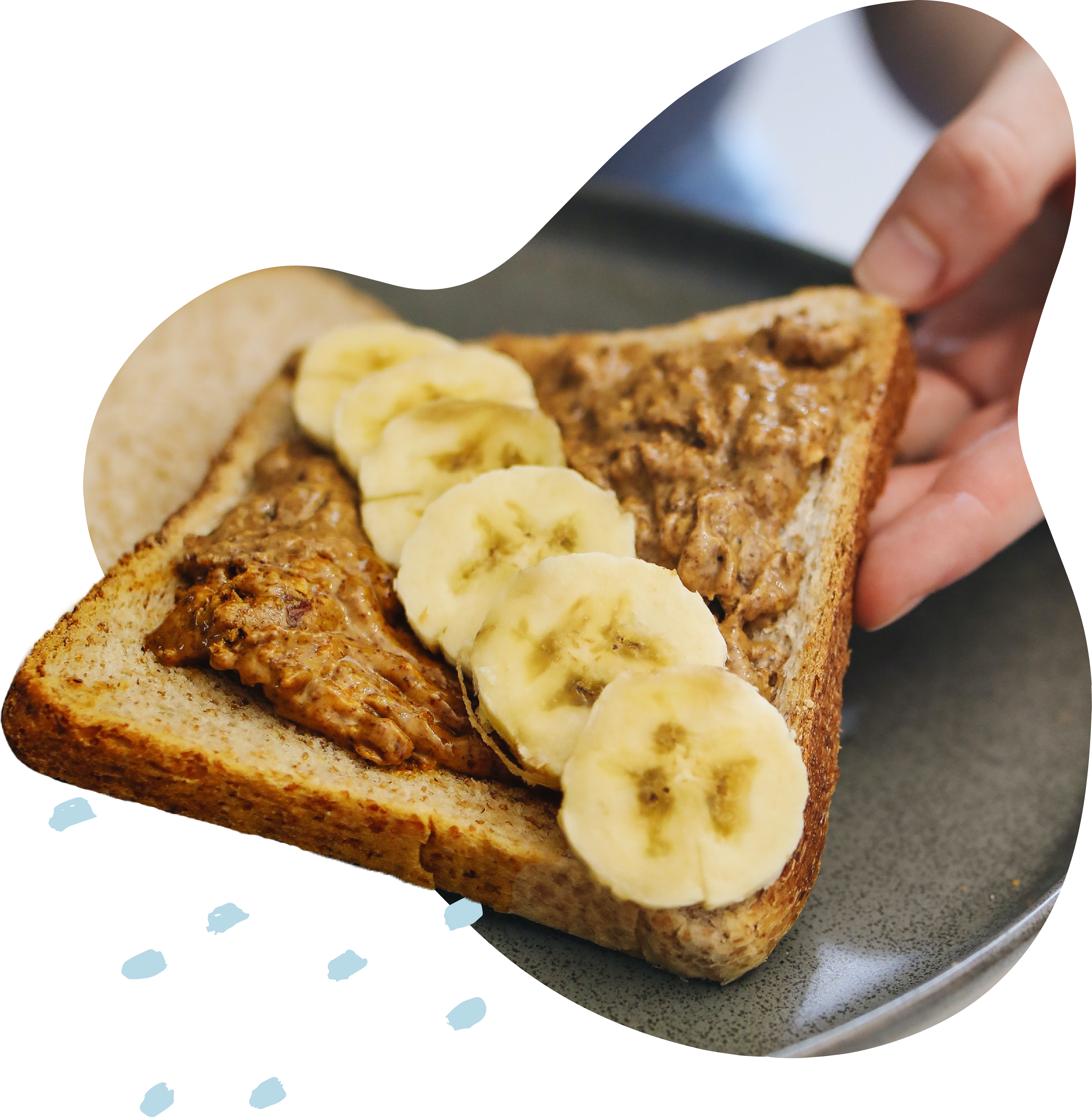 Woman reaching for peanut butter banana toast