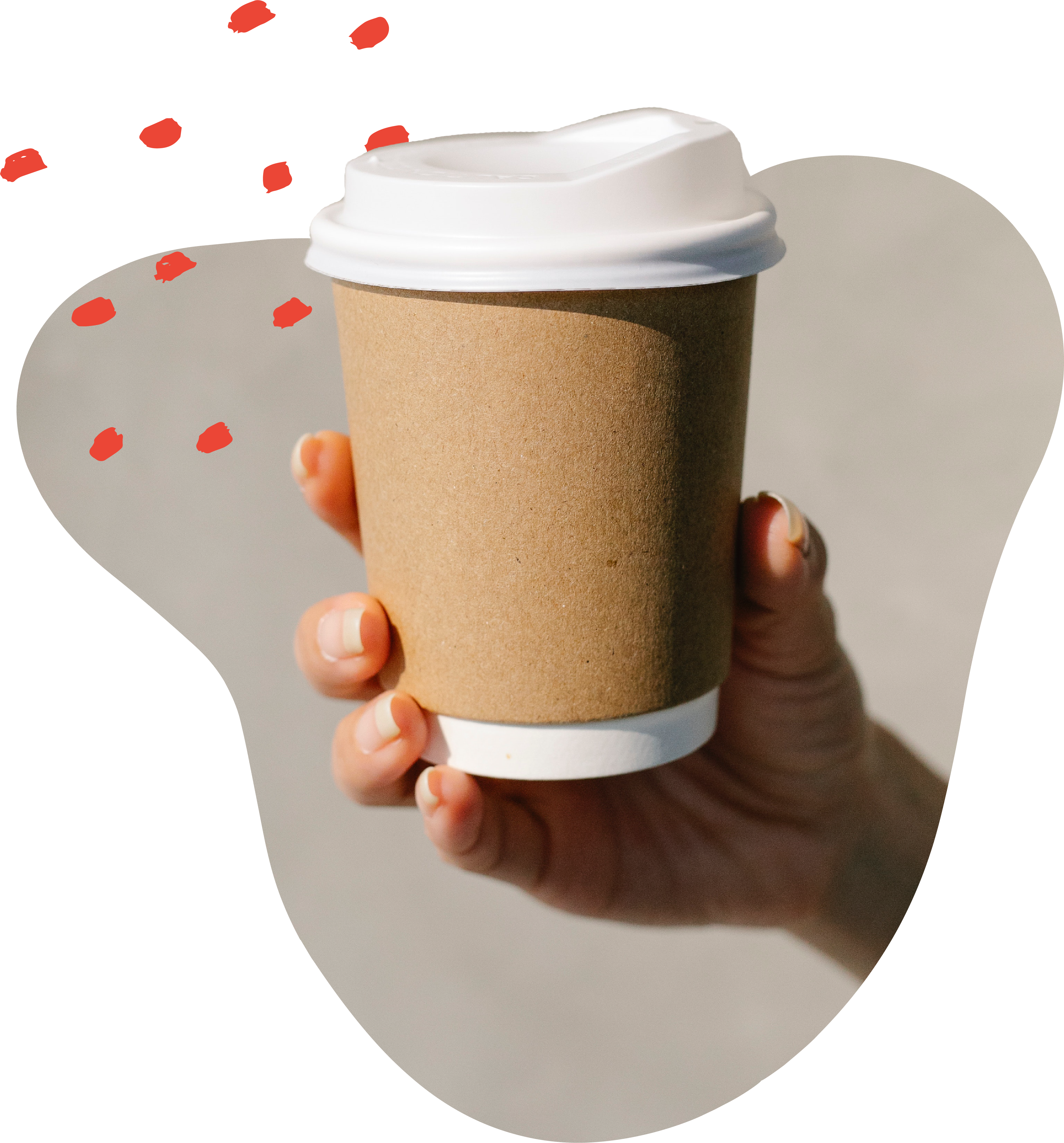 Woman holding to-go cup of coffee