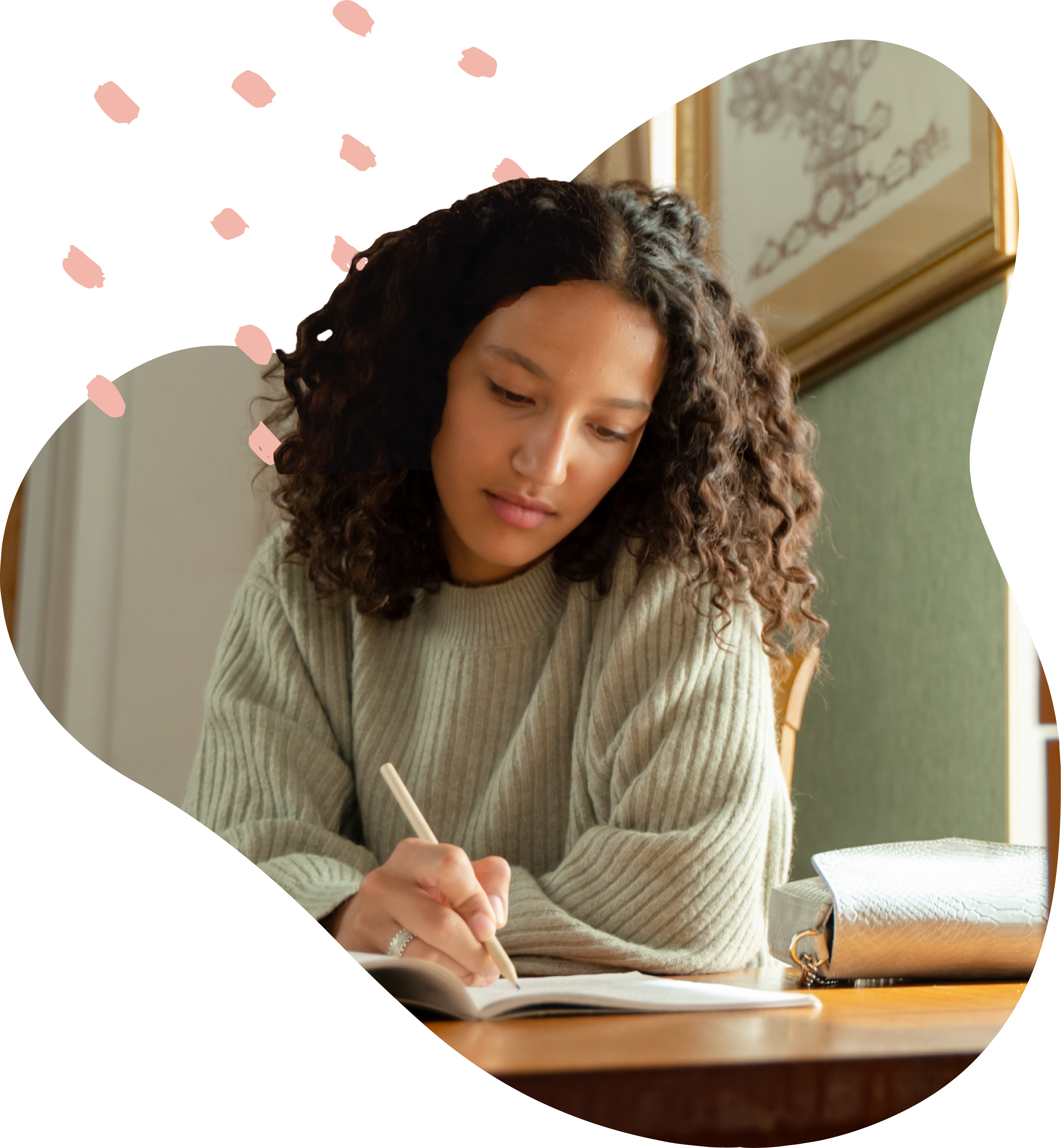 Woman studying in library near windows